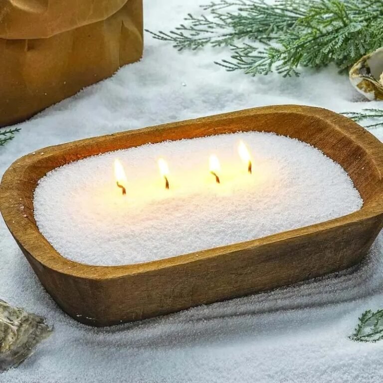 Helmivahasta tehty kynttilä puukulhossa
